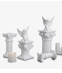European white resin cherub statues set on varying Roman pillar pedestals for decor