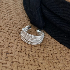 Detailed close-up of S925 sterling silver multi-layer intertwined ring with S925 hallmark