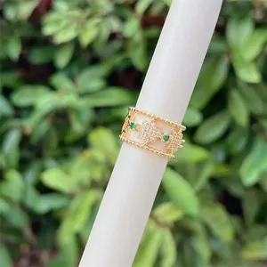 18K gold plated hollow star ring with green zircon and micro-pave diamonds
