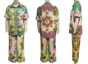 Detail view of the retro fruit and polka dot print on this stylish two-piece summer set
