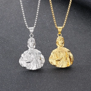 Detailed comparison of gold and silver St. Jude pendant necklaces in polished steel