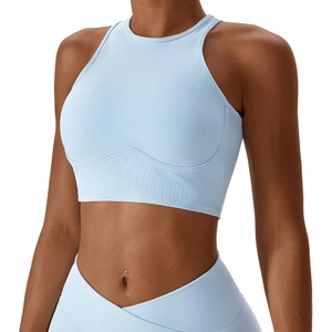 Light blue ribbed racerback sports bra and high-waisted leggings set for gym workouts