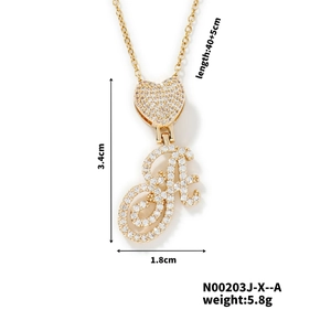 Detail of gold letter A pendant with heart motif and sparkling cubic zirconia pavé