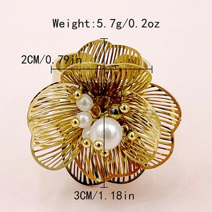 Detail view of gold flower ring with pearls showing 5.7g weight and 3cm dimensions