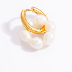 Detail of 18k gold stainless steel hoop earrings with natural freshwater pearls