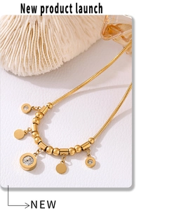 Golden Roman numeral necklace with zircon pendant and charms on an elegant snake chain