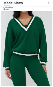 Detail of V-neck long sleeve sports sweatshirt in Christmas green with white striped cuffs