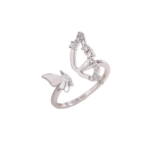 Exquisite silver butterfly open ring with zircon stones on a white background