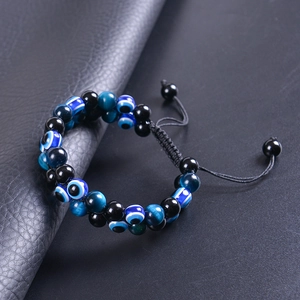 Double-layer evil eye bracelet with tiger eye beads and black braided adjustable cord