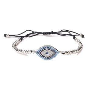 Detailed close-up of Evil Eye beaded bracelet with silver beads and multicolored crystals
