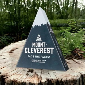 Mount Cleverest trivia game in blue triangular box placed on a natural wooden stump