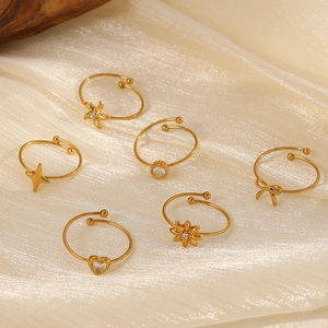 Luxury 6-piece adjustable stainless steel ring set with zircon accents on fabric