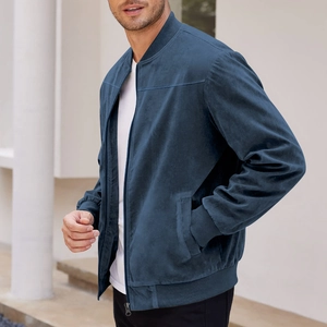 Detail of navy blue faux suede bomber jacket showing ribbed collar and premium fabric texture