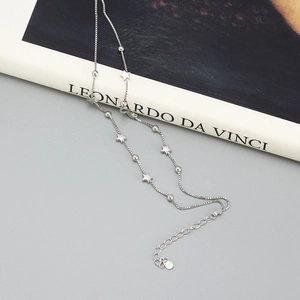 Close-up of S925 sterling silver double-layer star and bead bracelet with hallmark detail