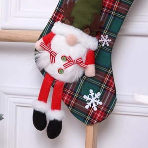Knitted Christmas stocking with 3D Santa gnome plush doll and festive plaid pattern