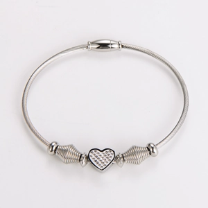 Detailed view of women's stainless steel wire rope bracelet with pavé crystal heart charm