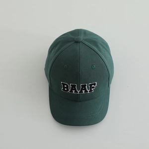 Top-down view of dark green baseball cap featuring BAAF embroidered letter patch
