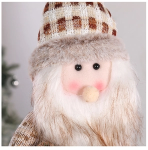 Detail of plush snowman with knitted hat, faux fur beard and wooden nose decoration