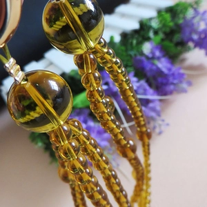 Amber crystal beaded strap for handbags with transparent resin beads and long crossbody chain