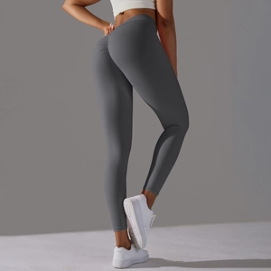 Detail view of dark grey high waisted scrunch butt yoga leggings with push up effect