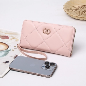 Pink quilted leather long wallet for women with wristlet and zipper closure