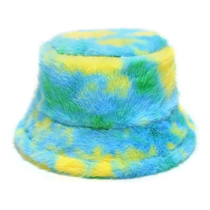 Close-up of the plush faux fur texture on a blue and yellow tie-dye winter bucket hat
