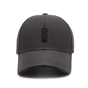 Dark grey sport baseball cap with textured fabric and vertical SPORT patch detail
