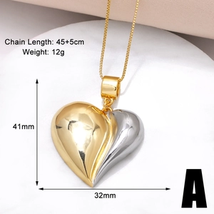 Detailed view of two-tone heart pendant necklace with size dimensions and specifications