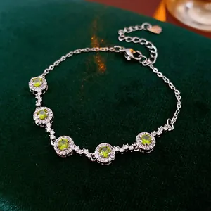 Luxury round green zircon bracelet in silver finish with white diamond accents