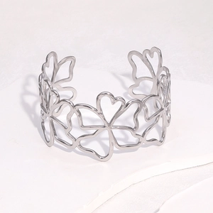 Bracelet jonc argenté ajustable avec motif floral évidé en acier inoxydable