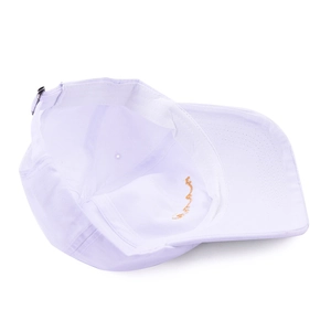 Detail view of cotton baseball cap interior showing stitching and metal adjustment buckle