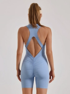 Light blue backless athletic bodysuit featuring scrunch butt lifting and open back design