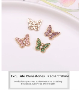 Detailed view of hollow butterfly charms with pink, green and purple crystals for DIY jewelry