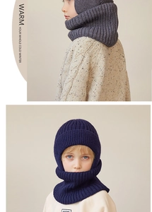 Detail of winter knitted hood scarf with thick ribbed texture in dark grey and navy