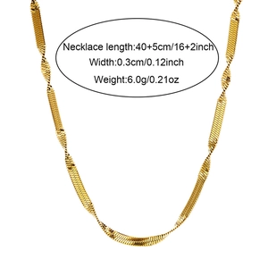 Detailed view of golden snake chain necklace with specifications of 40+5cm length