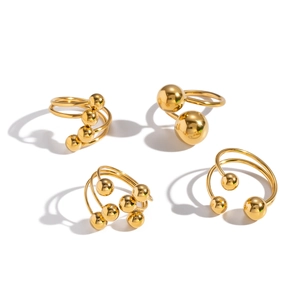 Geometric stainless steel gold beaded rings set with minimalist multi-layer spiral designs