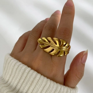 18k gold plated stainless steel leaf ring displayed on a female hand for a stylish look