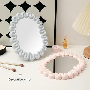 Cream style wavy wavy frame makeup mirror in blue and pink for desk decor