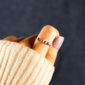 Rotating stainless steel anxiety ring with multi-color enamel beads for stress relief
