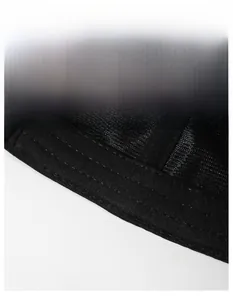 Detail of widened sweatband on a men's black baseball cap with premium stitching