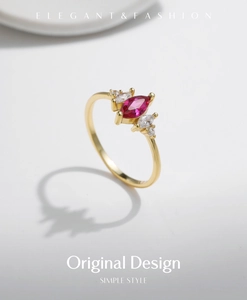 Detail macro view of an elegant S925 silver marquise-cut red ruby ring with gold plating
