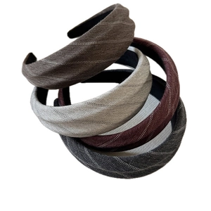 Minimalist fabric striped headbands in four colors with herringbone texture