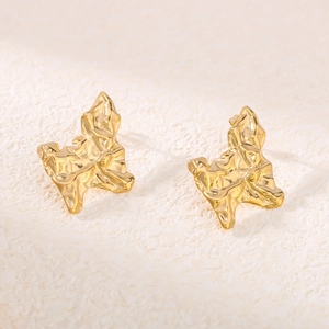 Vintage irregular golden butterfly earrings with textured metal finish for women