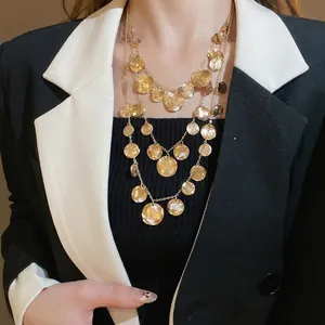 Three-layer gold-plated metal necklace with hammered round disc pendants for women