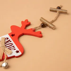 Christmas reindeer wooden hanging ornament with SNOW lettering and a silver bell decoration