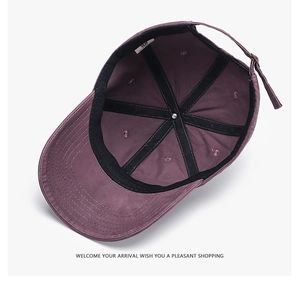 Detail showing inner structure of cotton baseball cap with sweatband and adjustable metal buckle