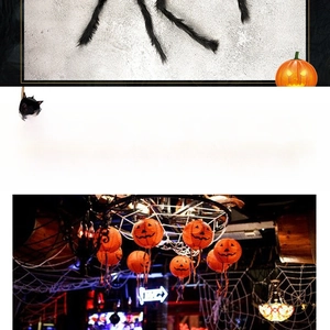 Giant black hairy spider with orange pumpkin lanterns and faux cobwebs for Halloween
