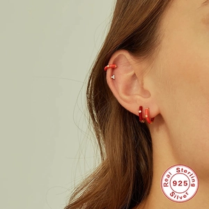 Authentic 925 sterling silver hoop earrings set with red enamel and pavé rhinestones
