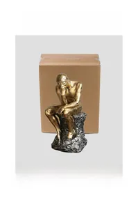 Close-up of Nordic thinker sculpture with vintage bronze finish and its packaging box