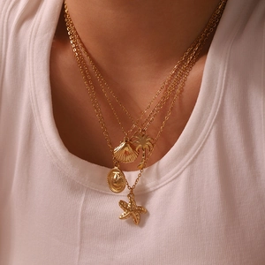 Three-layer gold-plated stainless steel necklace set with starfish and shell charms